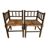 Turned wood corner armchairs