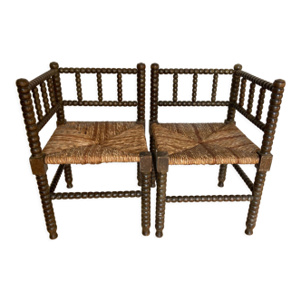 Turned wood corner armchairs