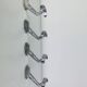 4 wall hooks in aluminium, 1950s