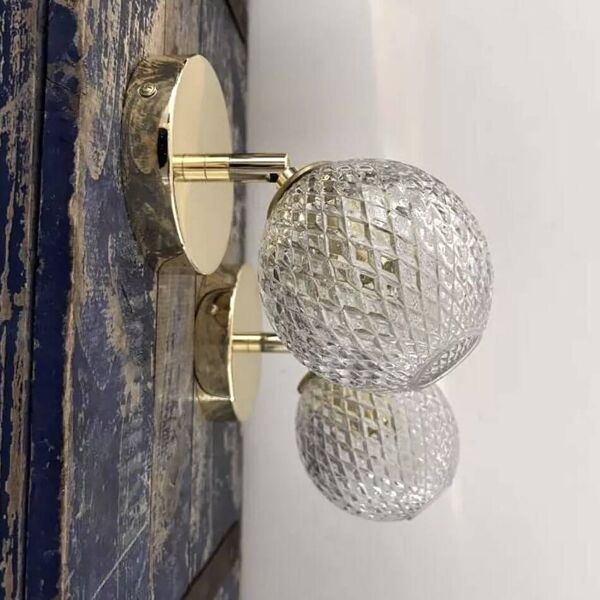 Paire d’appliques murales globes ciselés