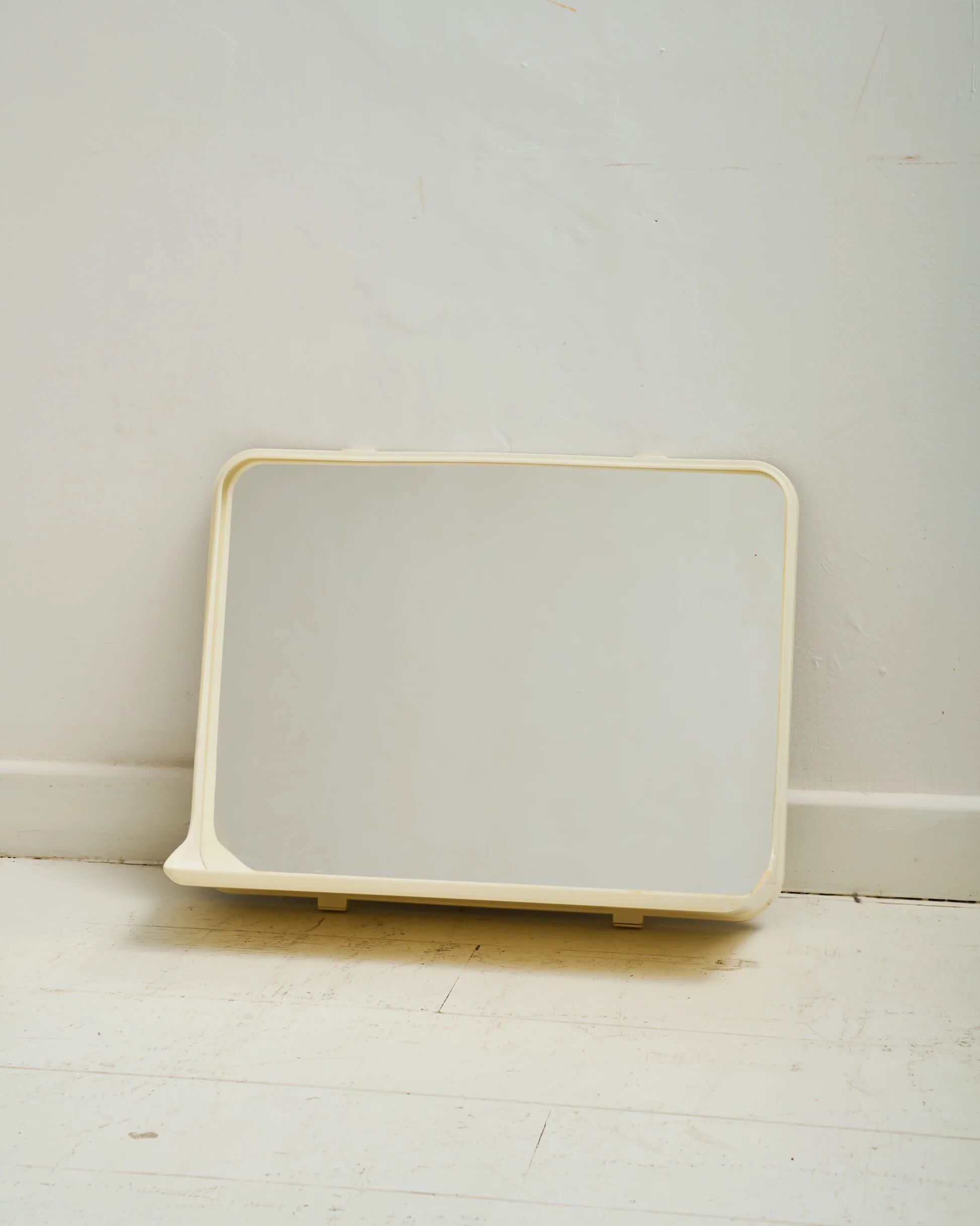 Plastic wall mirror with integrated shelf, 1970s