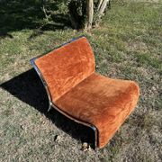Chrome steel armchair and orange fabric by Vittorio Introini