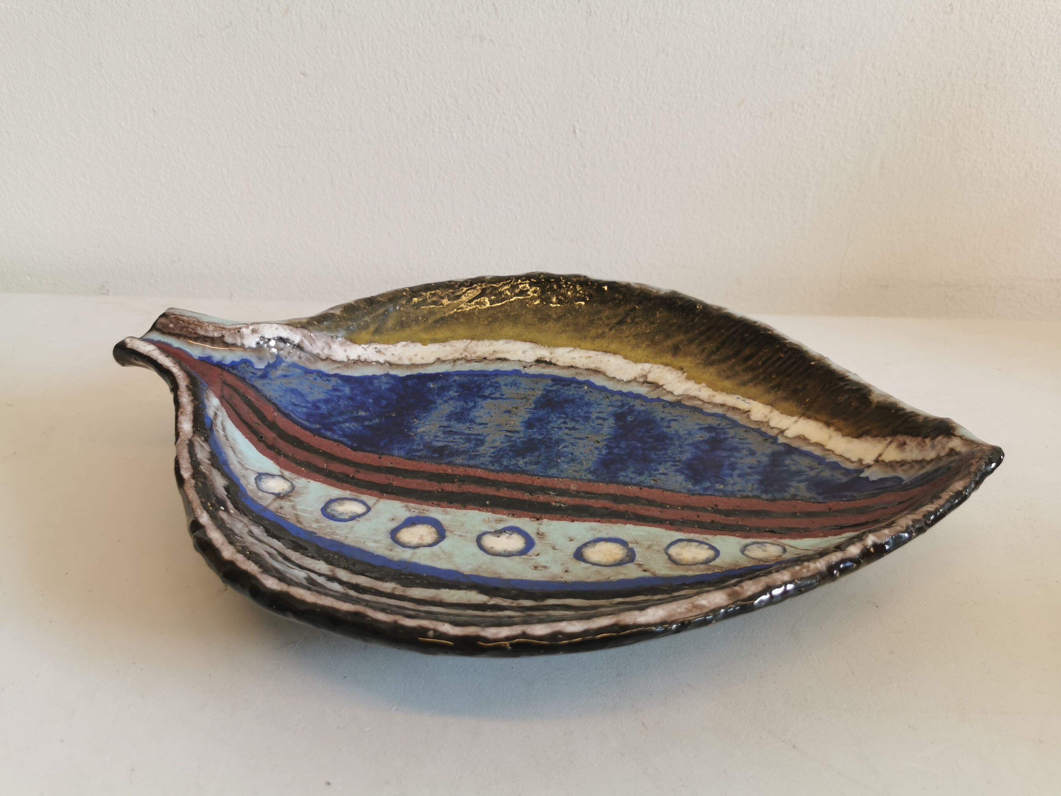 Danish ceramic dish shaped like a leaf.