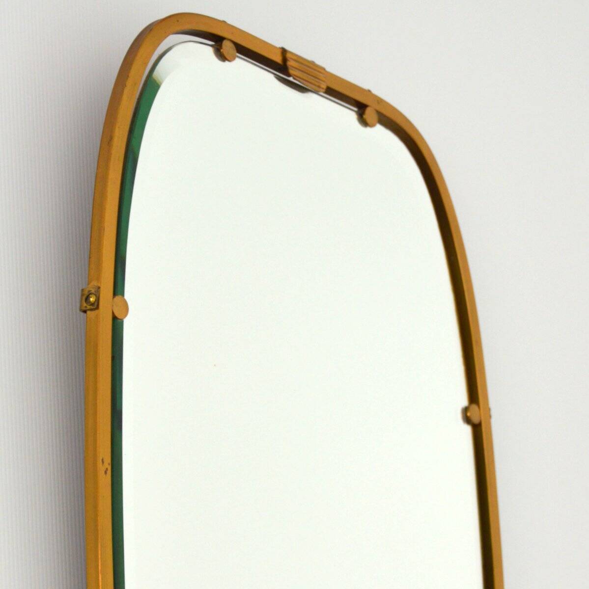 Superb free-form mirror in solid brass from the 50s/60s vintage.