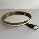 Round wall mirror with brass frame and leather hanger, 1960, Germany