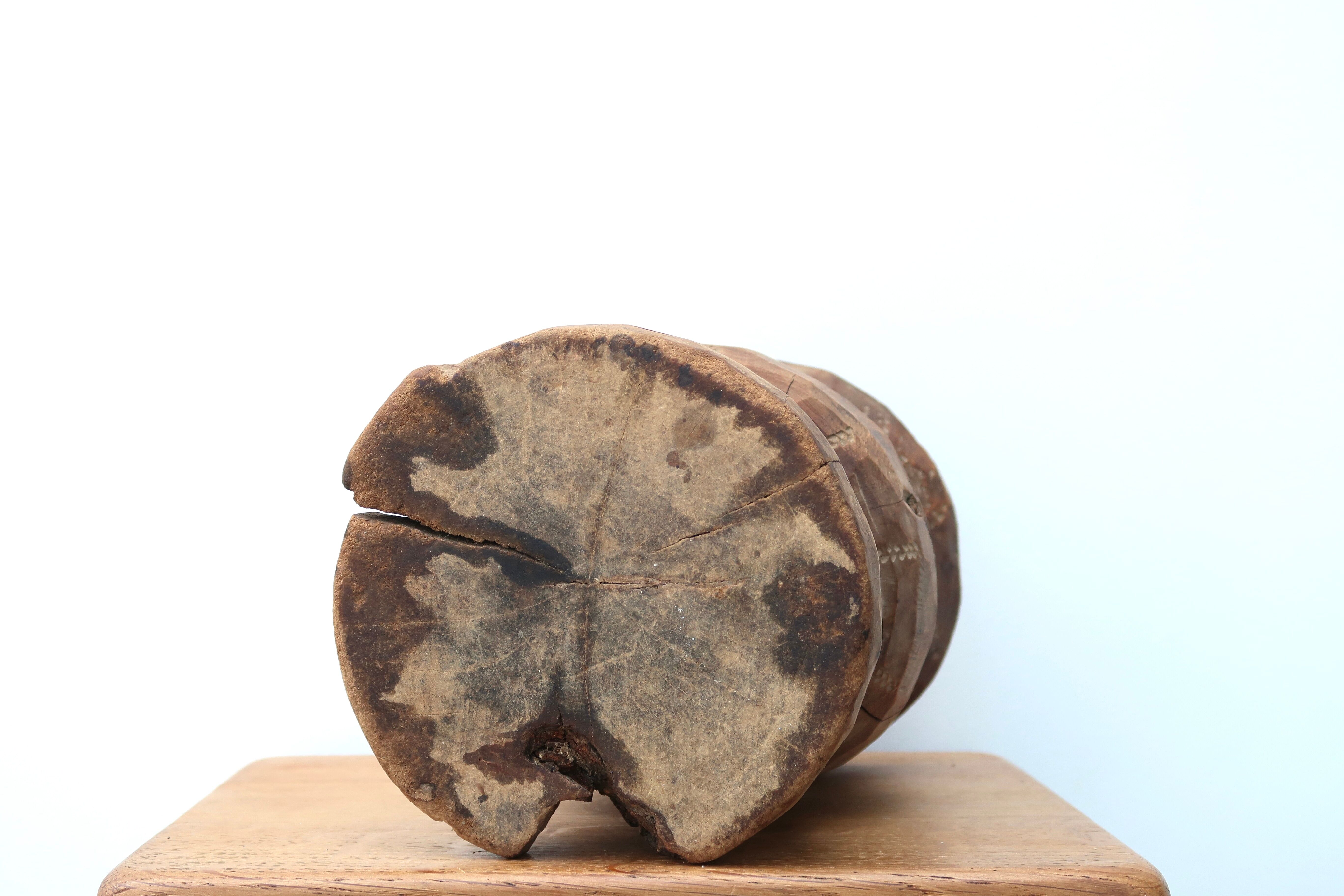 African mortar in carved wood, cast iron pestle, 70s