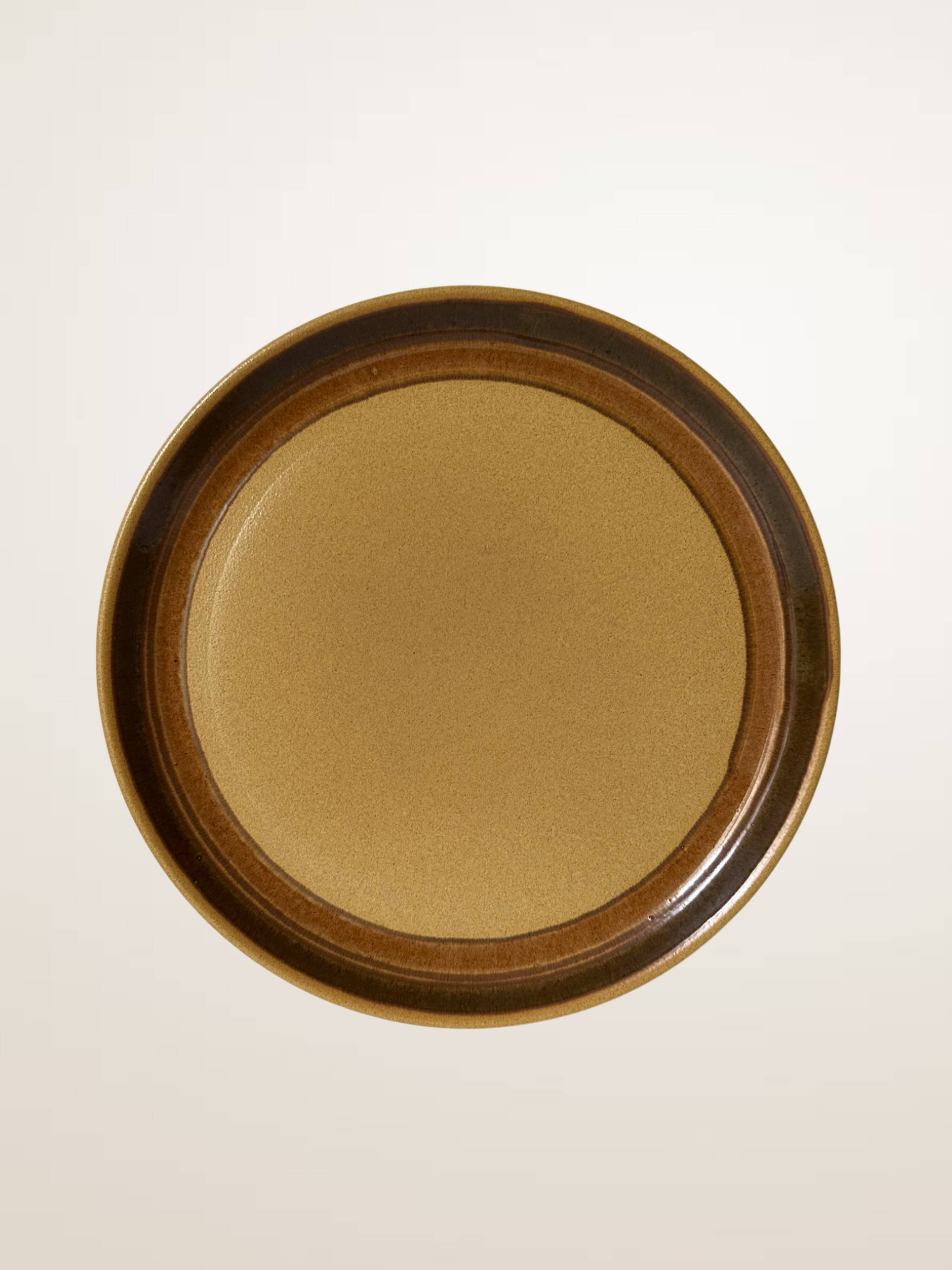 Set of six glazed stoneware dessert plates.