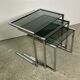 Nesting table in chrome metal and smoked glass 1980