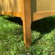 Vintage wooden and rattan baby cot from the 1960s.