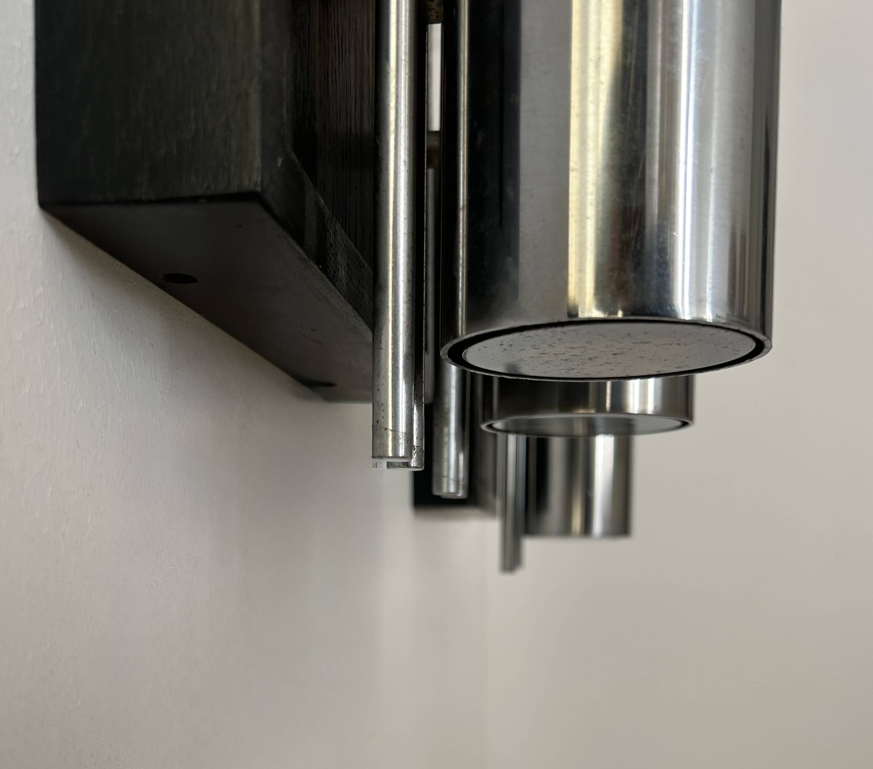 Pair of vintage wall lights, chrome-plated metal and blackened oak, France, 1970