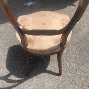 Louis-Philippe medallion chair from the 19th century in solid walnut.