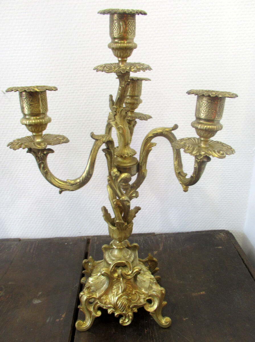 Pair of bronze candelabras and brass bobèches
