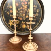 Pair of antique turned rose brass candlesticks (24 cm)