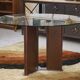 Circular table by Tito Agnoli for Matteo Grassi, base covered in brown leather, 1970s.