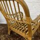 Fauteuil chauffeuse vintage en rotin des années 70