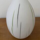 White opaline tulip with dark green and gray streaks. Oblong shape.
