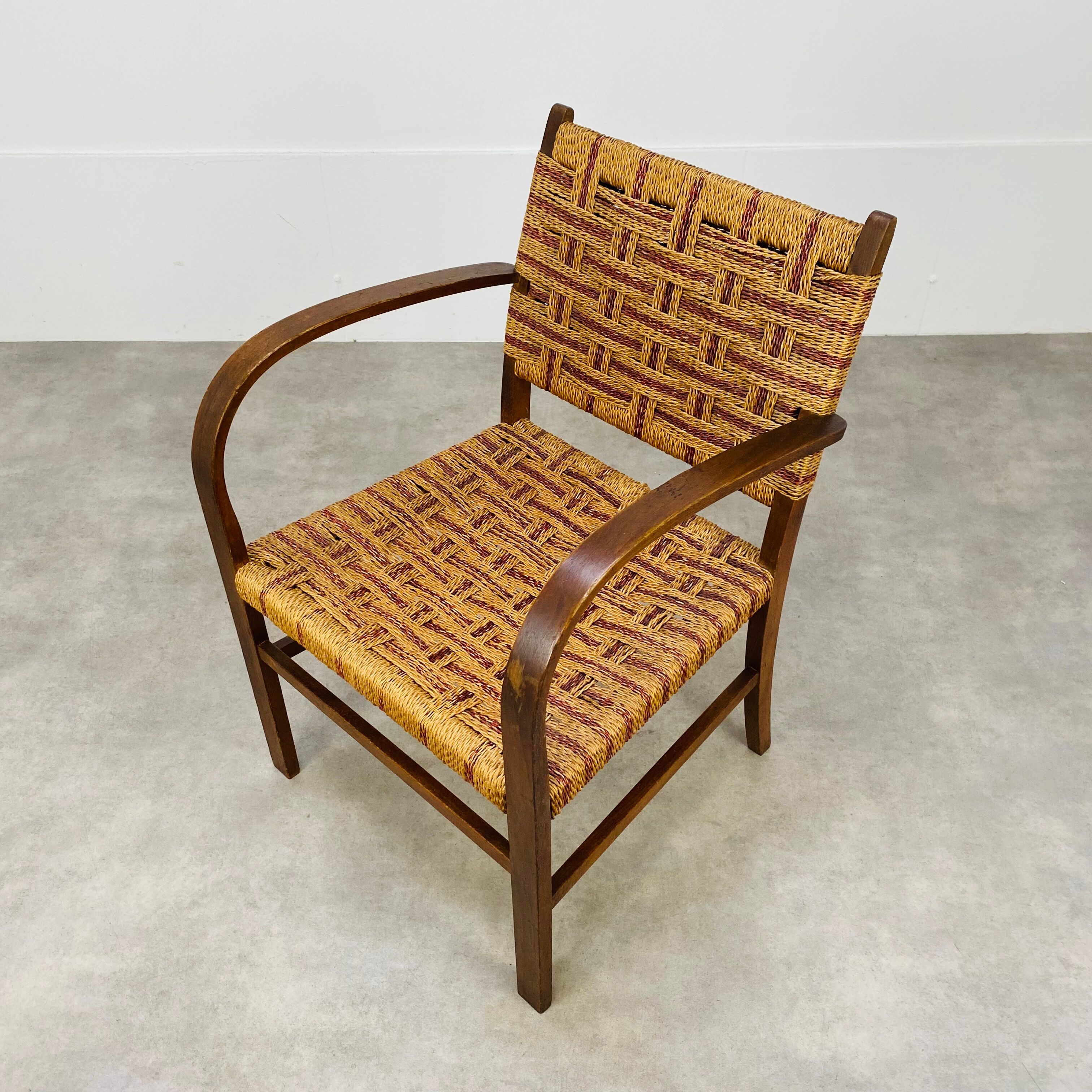 Scandinavian armchair in wood and vintage straw rope