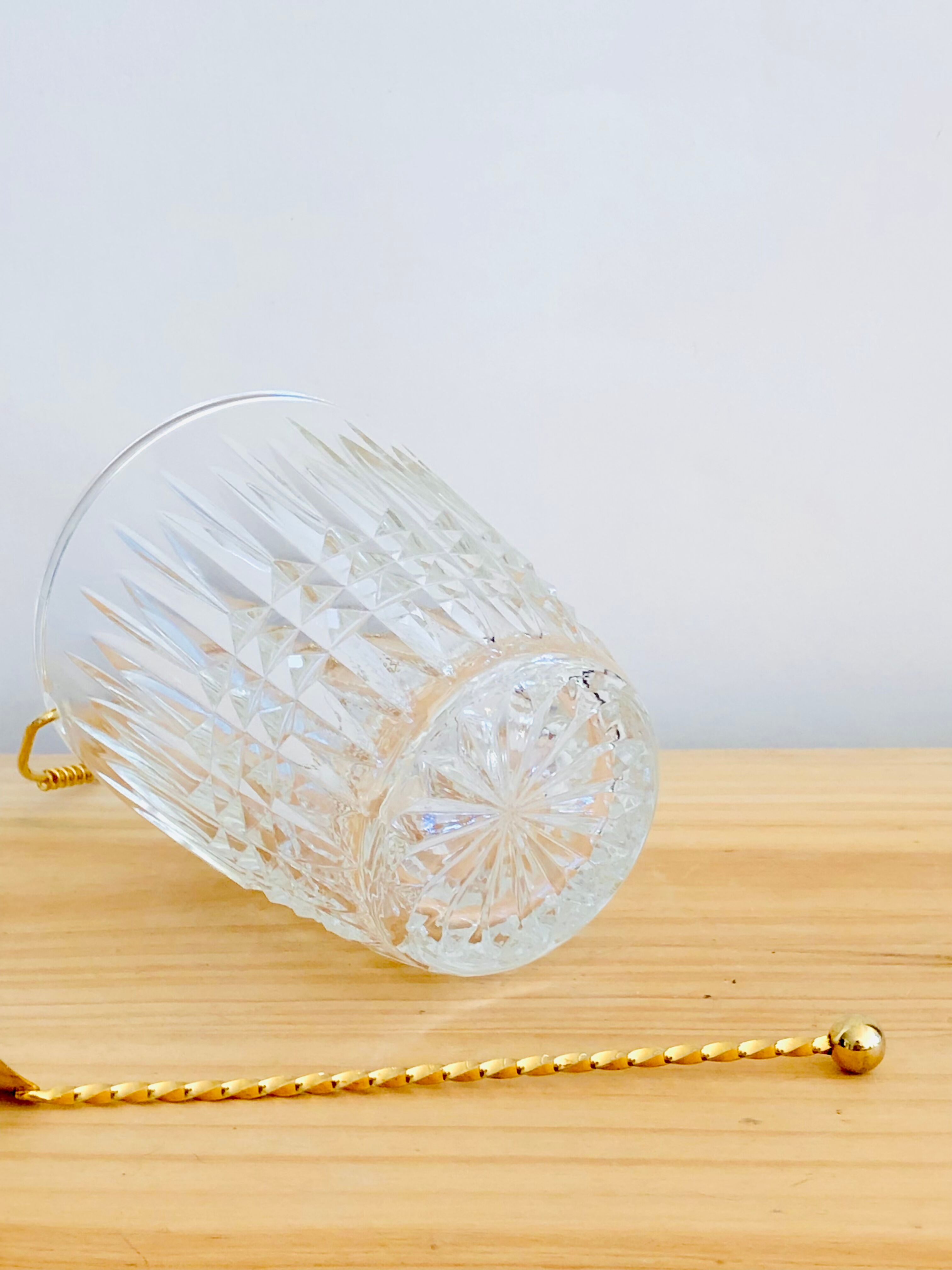 Crystal ice bucket and spoon thereof