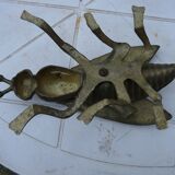 Old brass ashtray in the shape of a fly