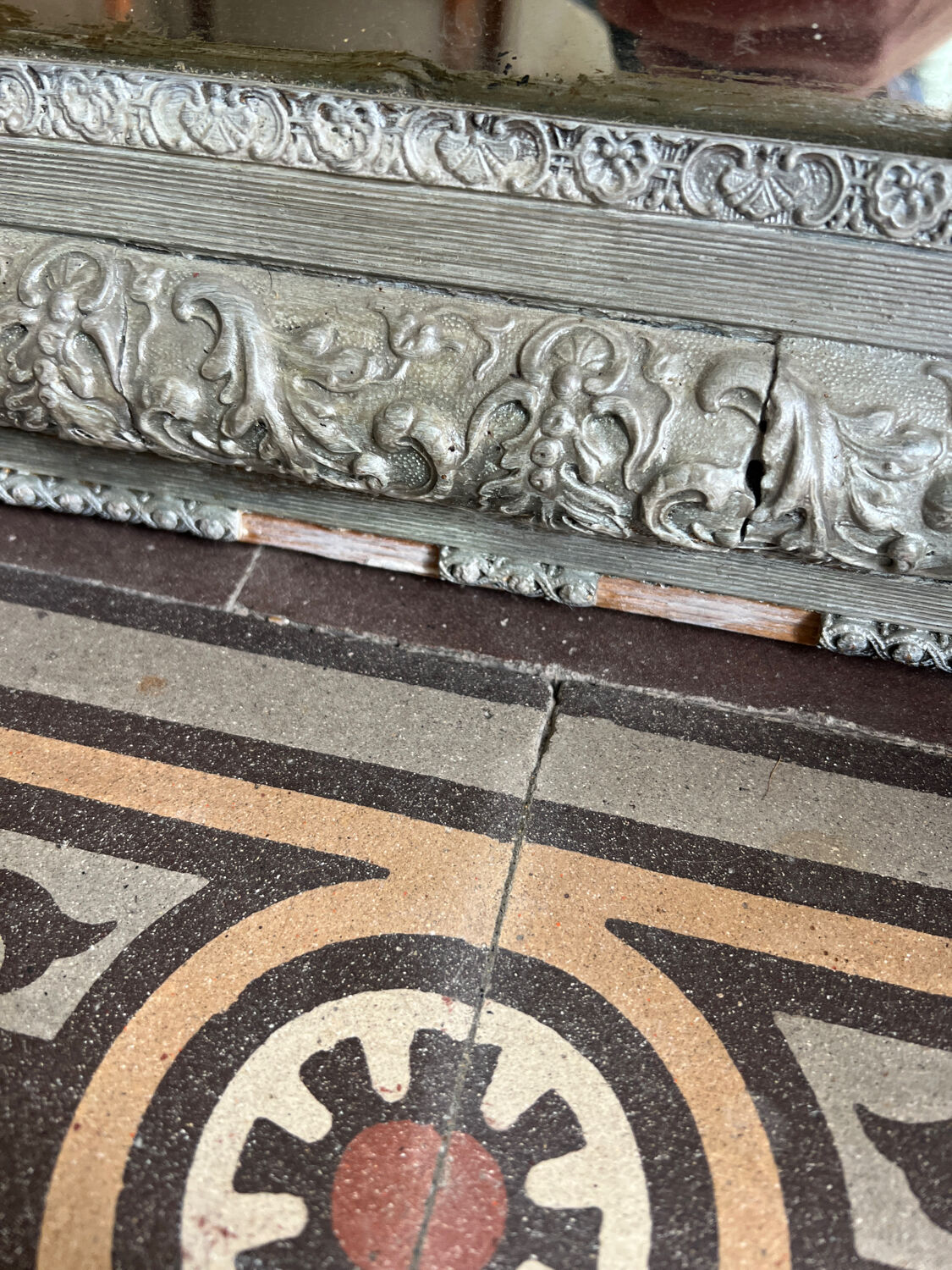 Antique mirror in stucco and wood