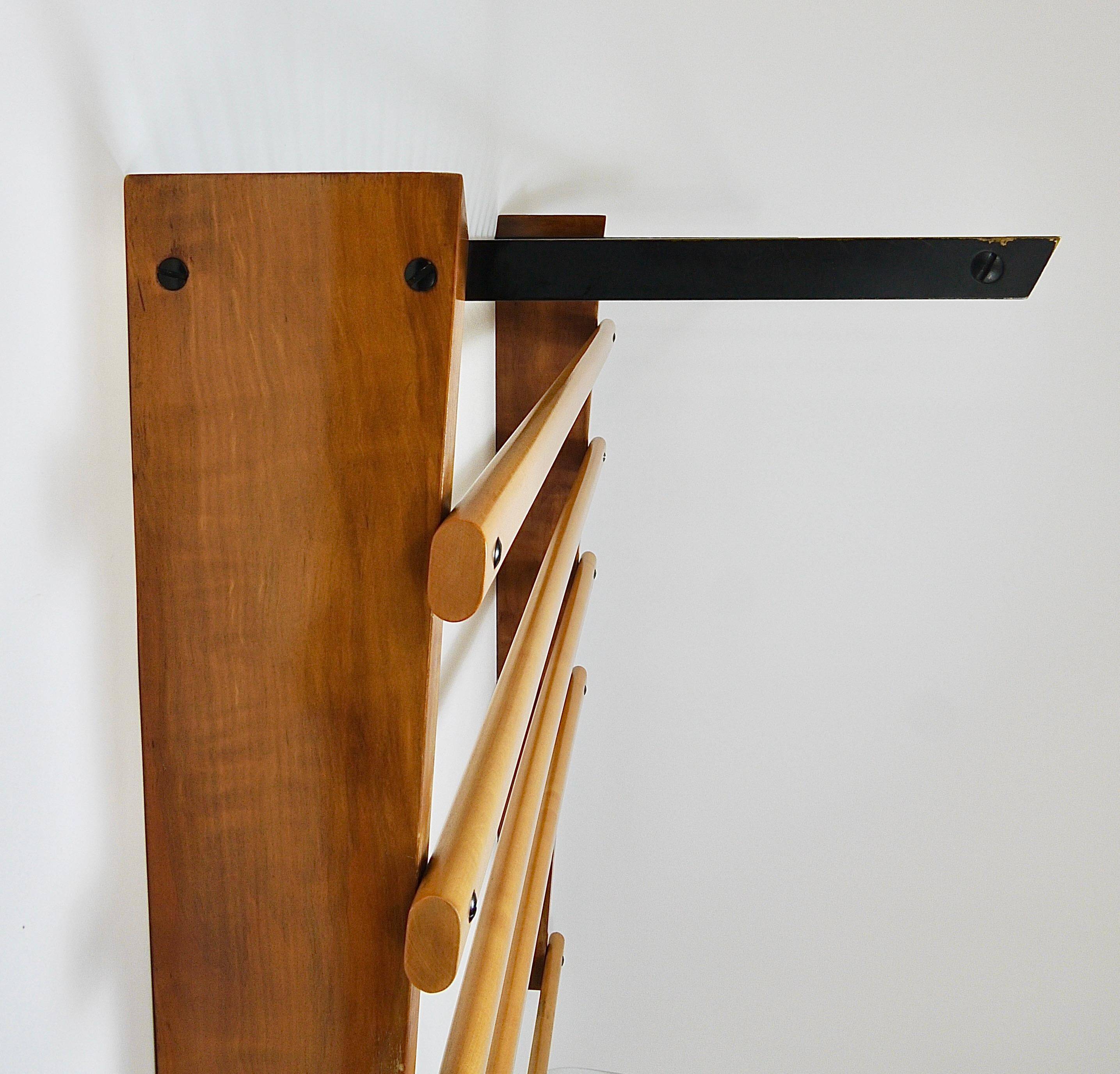 Rare coat rack by Carl Auböck with hat rack, cabinet, brass, walnut and beech, 1950s.