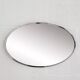 Oval mirror from the 1960s with a chrome frame.