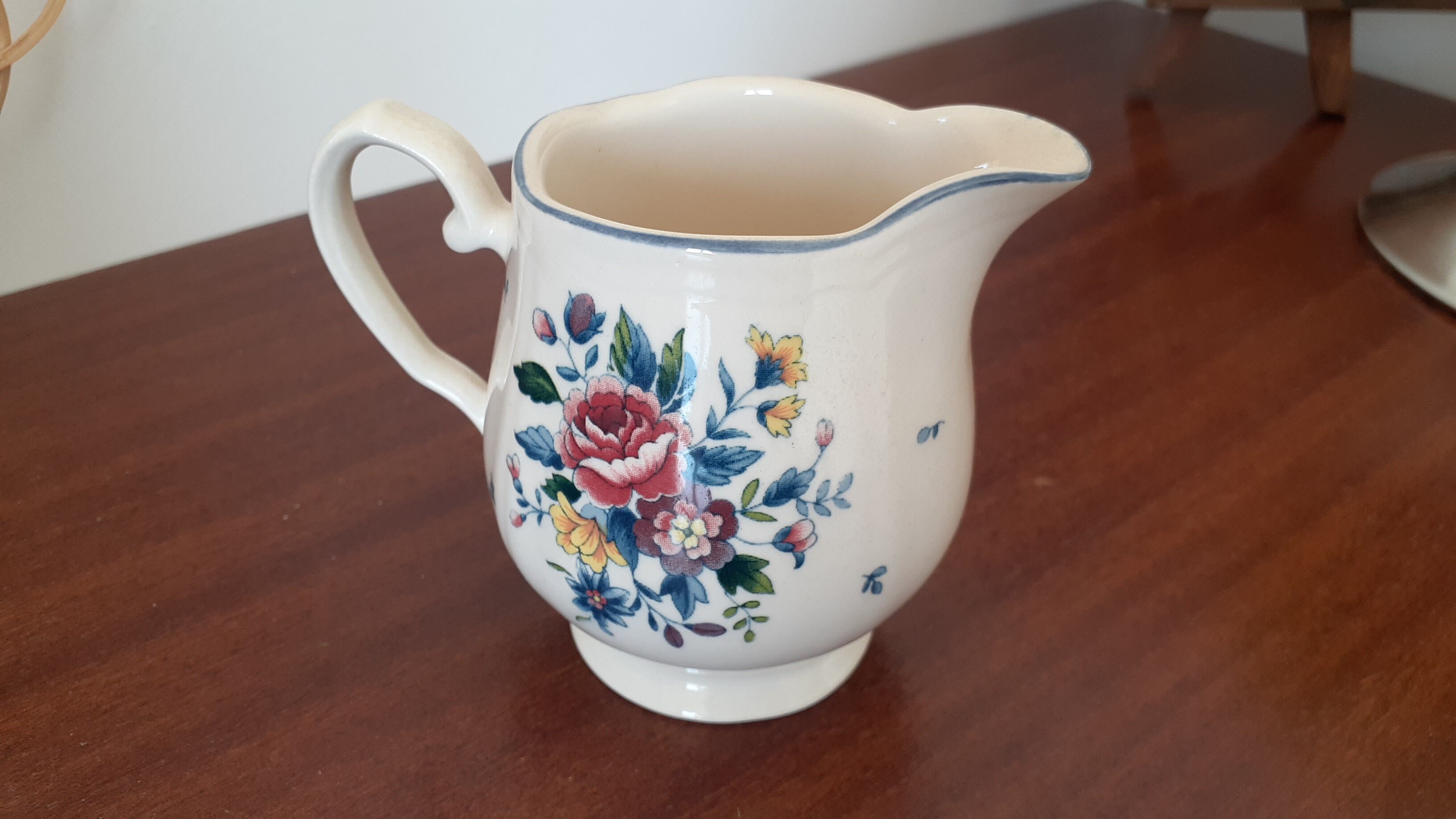 Flowery milk jug