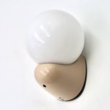 Beige Tissot wall light with opaque white glass globe, 1970s 80s.