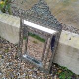 Antique mirror with copper moulding.