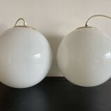 Pair of white Parscot globe pendant lights