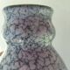 Thick ceramic vase in art deco style