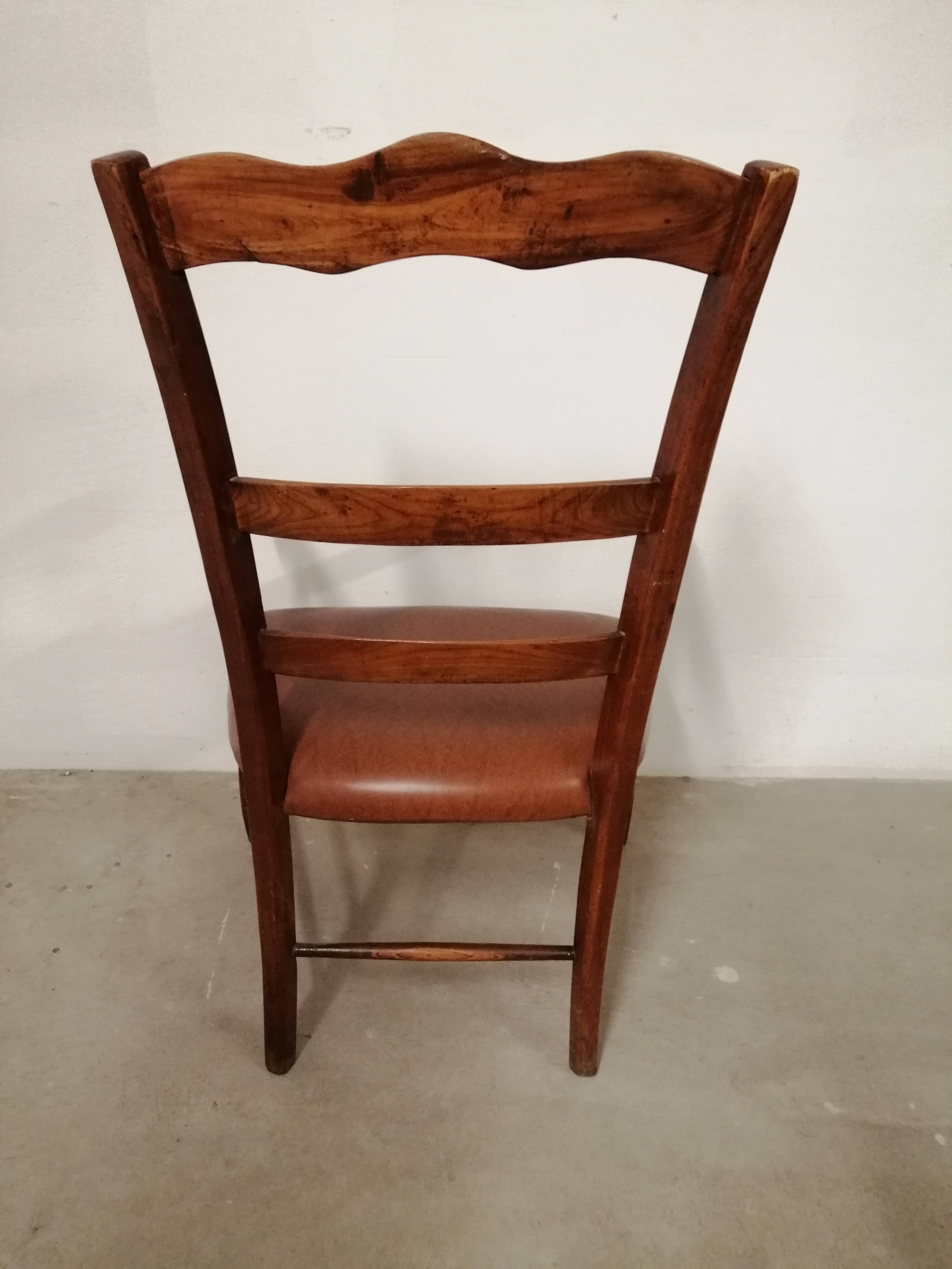 Solid wood and imitation leather armchair