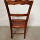 Solid wood and imitation leather armchair