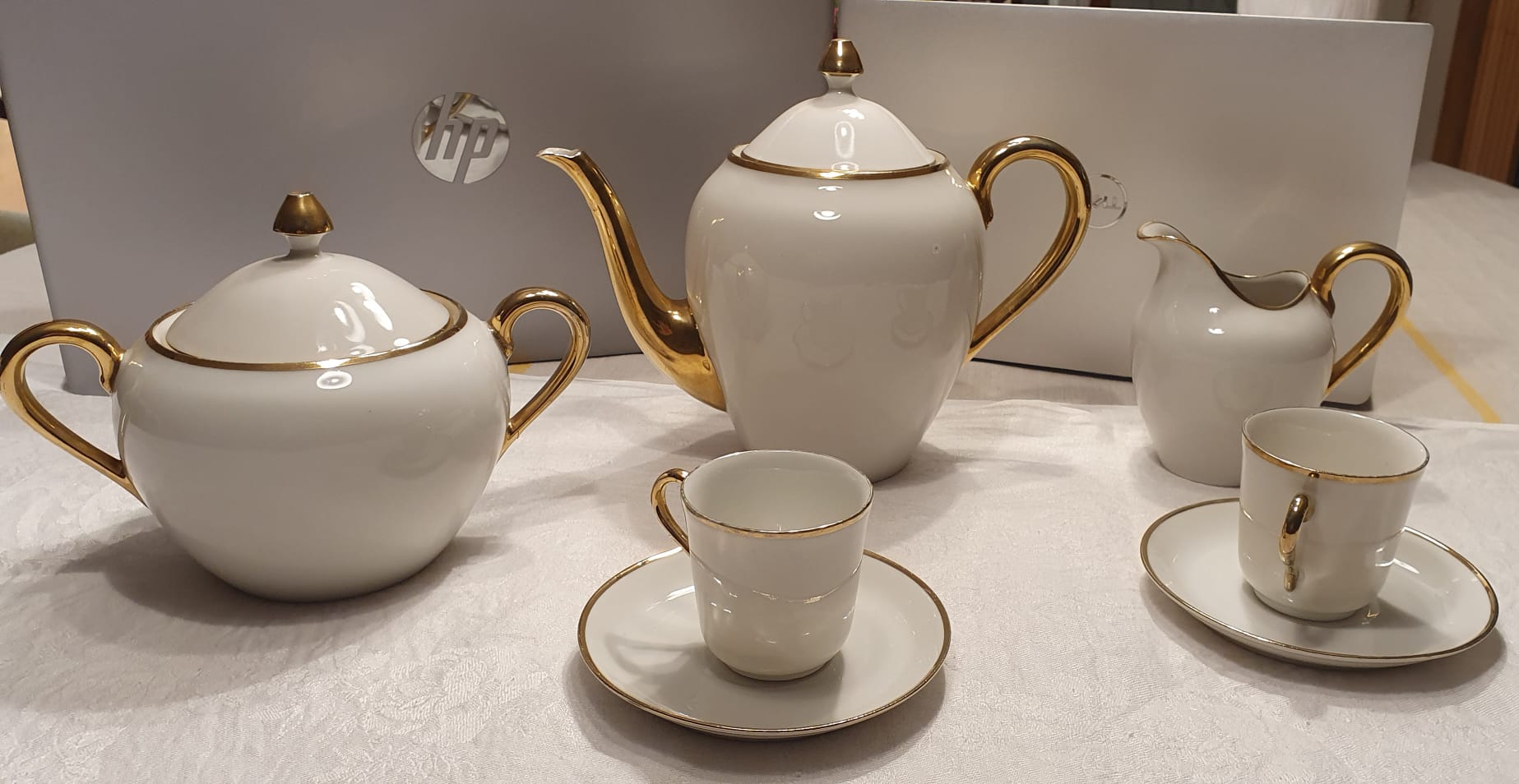 White and gold porcelain breakfast set