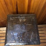 Old stool with vintage carved wood chest