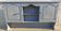 Two-door wall unit with niche in solid wood in grey limed finish