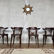 Série de 4 fauteuils vintage en bois courbé – Élégance intemporelle