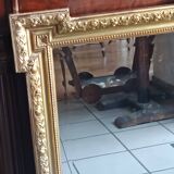 Antique mirror in wood and gilded stucco, neo Louis XVI style.