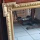 Antique mirror in wood and gilded stucco, neo Louis XVI style.