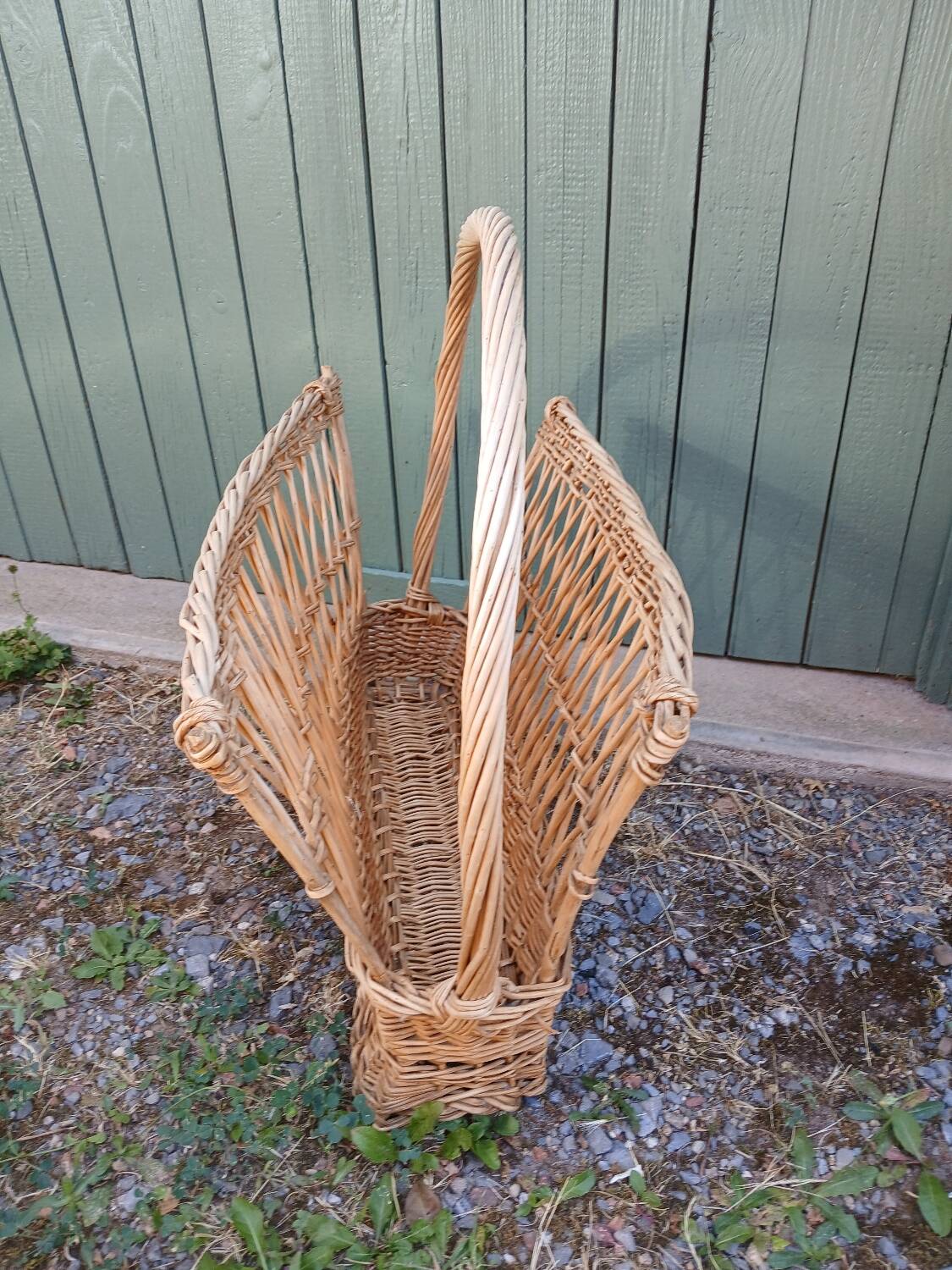 Antique wicker magazine rack