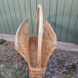 Antique wicker magazine rack