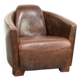Cowhide armchair in Aviator design in a warm brown colour