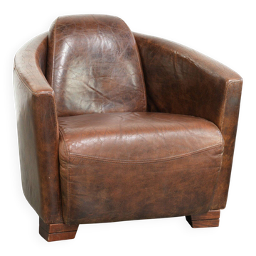 Cowhide armchair in Aviator design in a warm brown colour