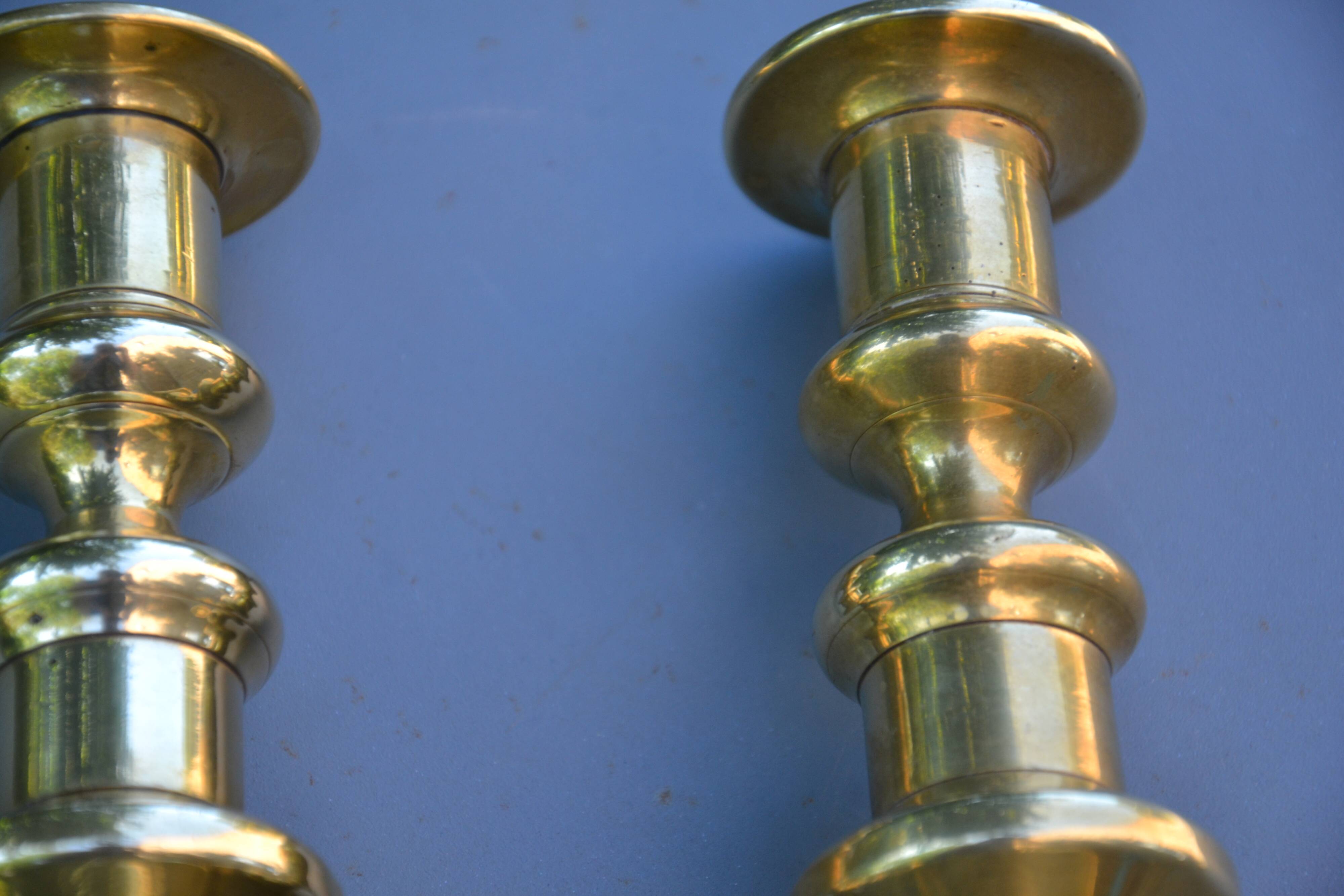 Two modern brass candlesticks