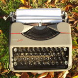 Hermes Baby typewriter with bag