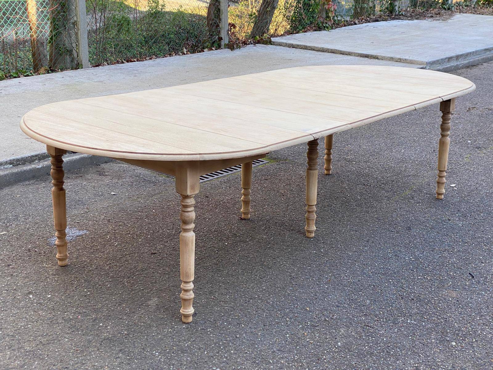 Renovated round extendable dining table with flaps, 6 extensions, 300cm.