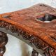 Antique stool in turned and carved solid wood
