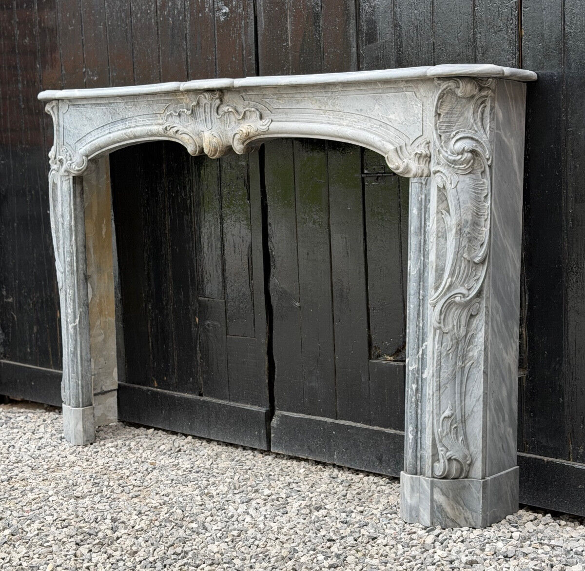 Louis XV fireplace in blue Turquin marble, 18th century.