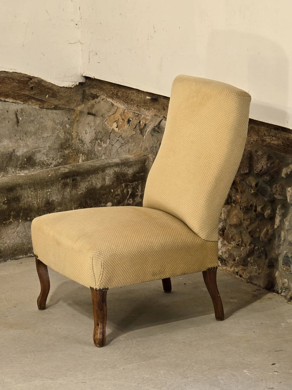 Pale yellow Napoleon III armchair