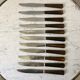 Lot de 11 couteaux à dents en bois années 50